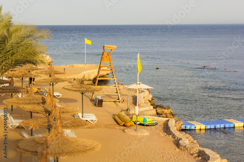 Beach at the sea without people in the evening photo