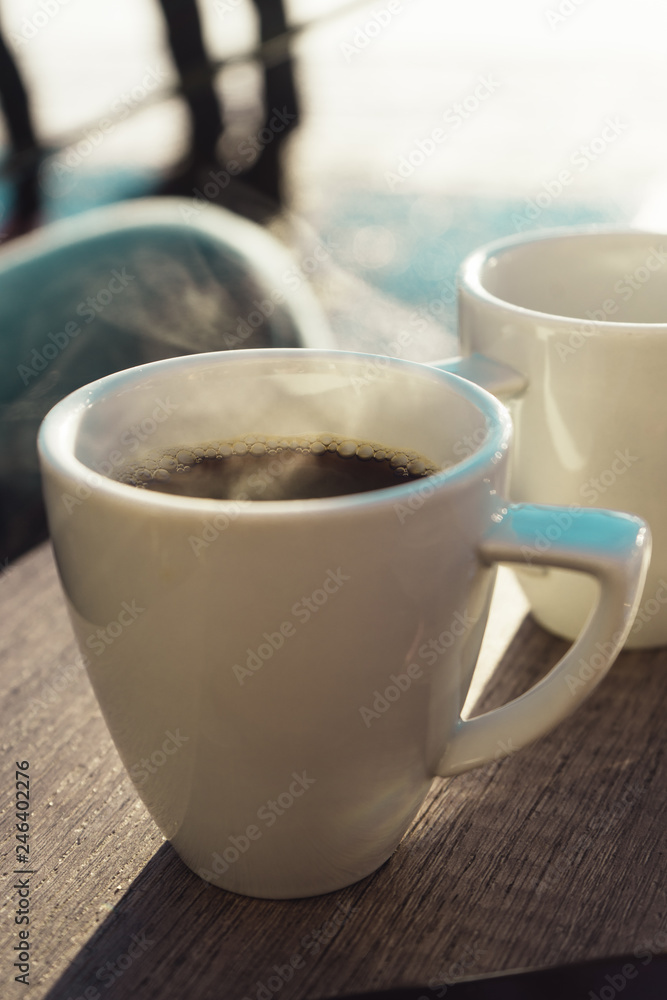 Hot coffee with smoke swirling up from it Hot coffee with smoke swirling up from it