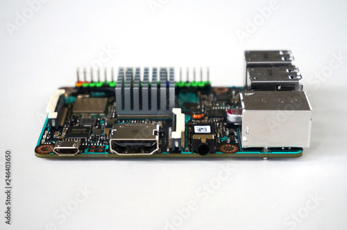 Small single-board computer with USB, Ethernet, HDMI, GPIO and radiator installed