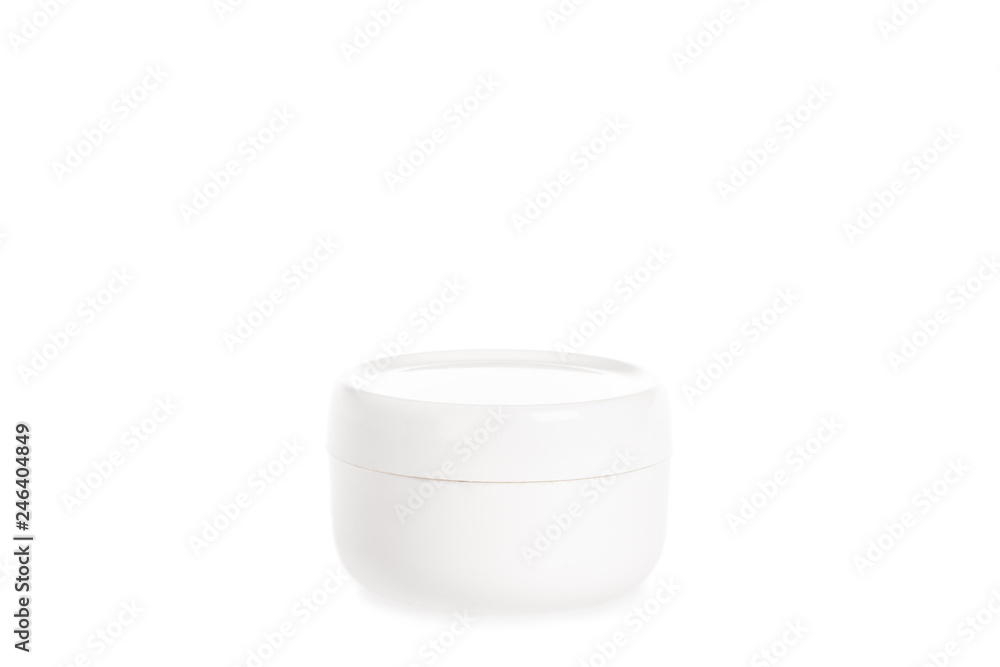 Studio shot of cream in plastic container isolated on white Studio shot of cream in plastic container isolated on white