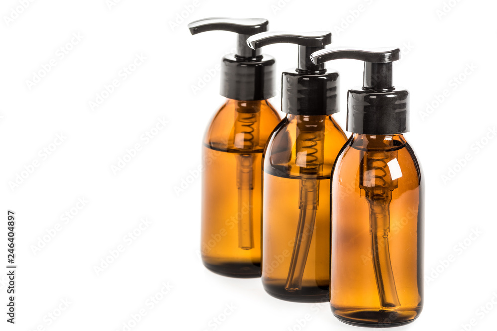 Studio shot of liquid soap bottles isolated on white Studio shot of liquid soap bottles isolated on white