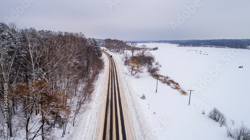 Aerial View of the Snow Road in Winter © ronedya