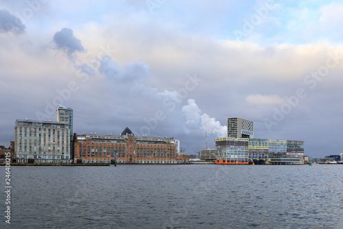Industrial buildings in a harbor of Amsterdam, Netherlands © castenoid