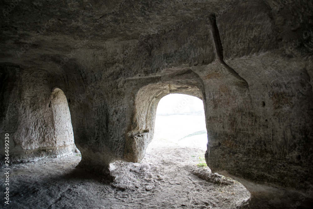 ancient cave hollowed out in the rock