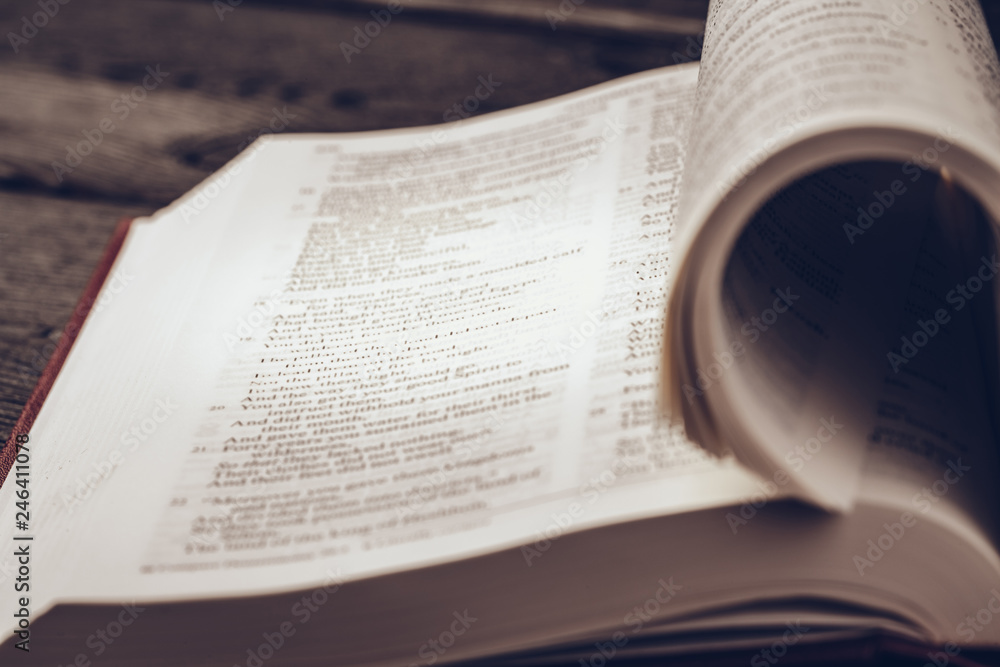 Fototapeta premium The Holy Bible on a wooden table.