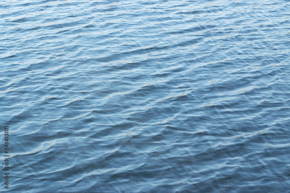 Water surface and ripple with reflection in the day for background concept. Water surface and ripple with reflection in the day for background concept.