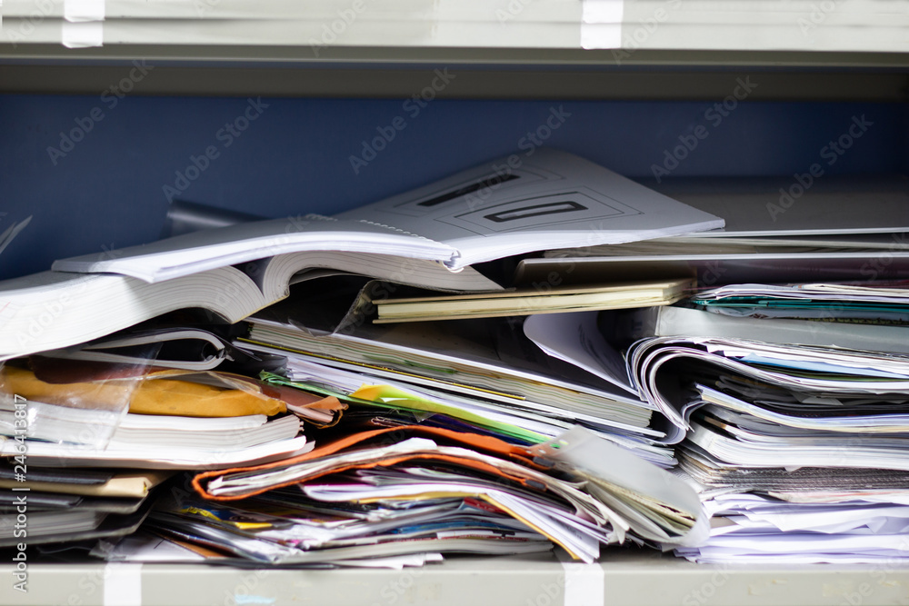 Messy file document and Office Supplies in filing cabinets at work office Messy file document and Office Supplies in filing cabinets at work office