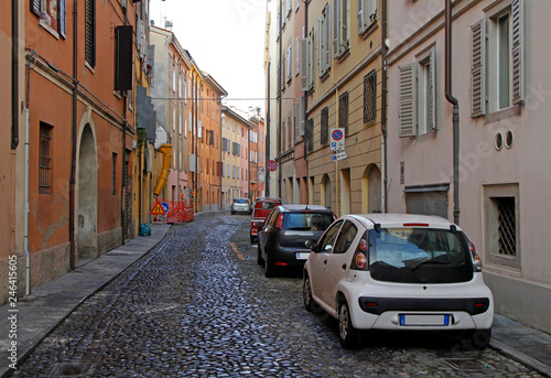 the narrow street in italian city Modena