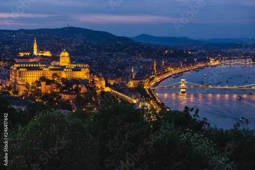 Panorama of Budapest's evening.Capital of Hungary.Beautiful big old town.The photo is made in the dark.The magnificent city is rich in history.City landscape with a wide large river. Golden city.