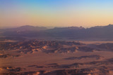 Aerial view of Arabian desert and mountain range Red Sea Hills near Hurghada, Egypt. View from airplane