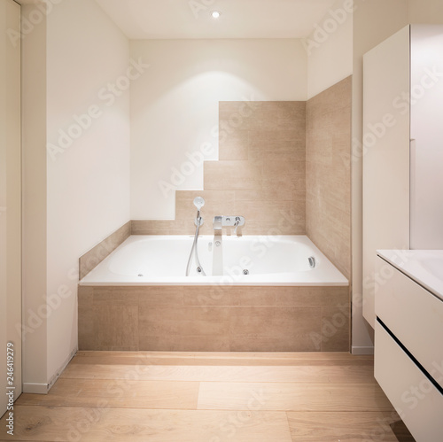 Modern marble bathroom with spotlights