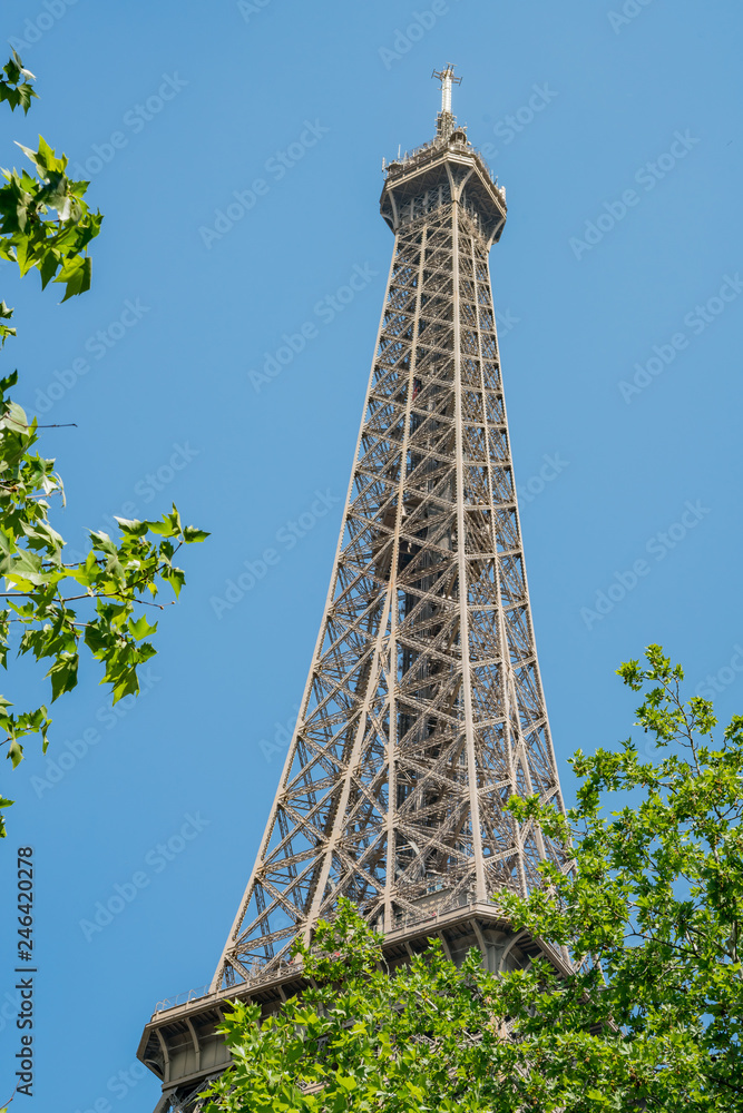 Afternoon sunny view of the famous Eiffel Tower