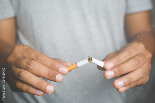 Man destroy Broken refusing cigarettes. concept for quitting smoking and healthy lifestyle.or No smoking campaign Concept. 
