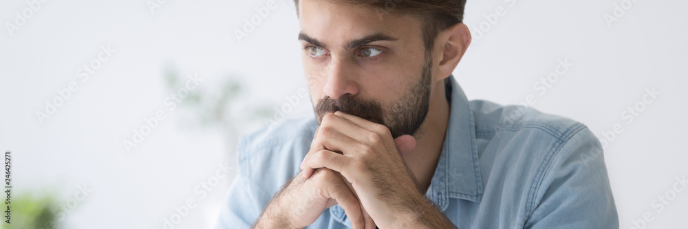 Horizontal photo close up face serious thoughtful pensive businessman student employee feels puzzled think about problem make decision concept banner for website header design with copy space for text - obrazy, fototapety, plakaty 