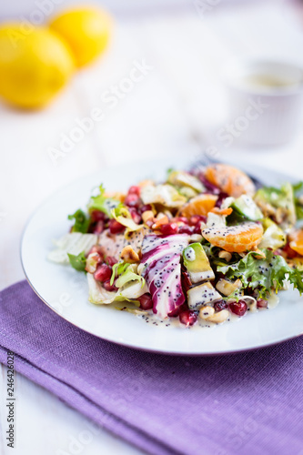 Salad with tangerines and avocado