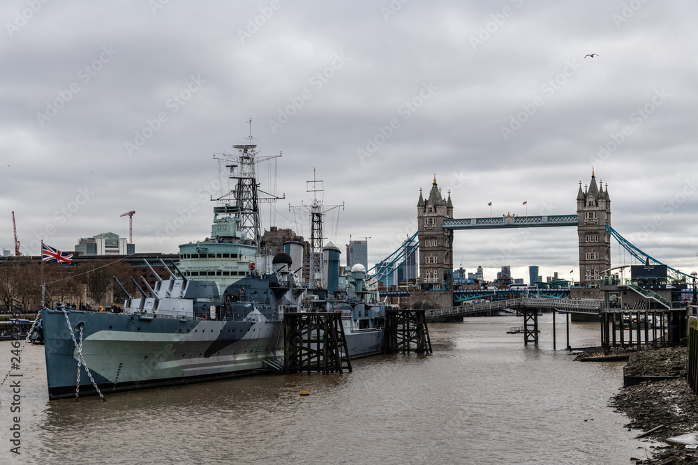 London Tower Bridge. The bridge is a combined bascule and suspension bridge in London built between 1886 and 1894 London Tower Bridge. The bridge is a combined bascule and suspension bridge in London built between 1886 and 1894