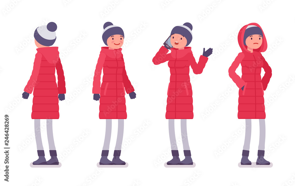 Obraz premium Stylish woman in a long red down jacket standing