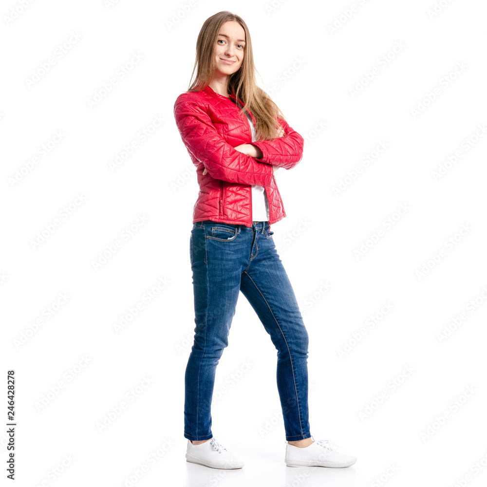 Beautiful woman in red jacket and jeans casual smile goes on white background isolation Beautiful woman in red jacket and jeans casual smile goes on white background isolation