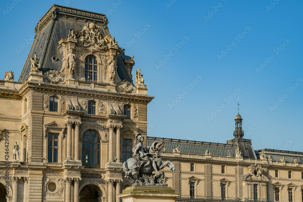 Close up shot of some statue of the famous Louvre Museum at Paris