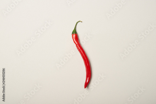 Top view of chili pepper isolated on grey