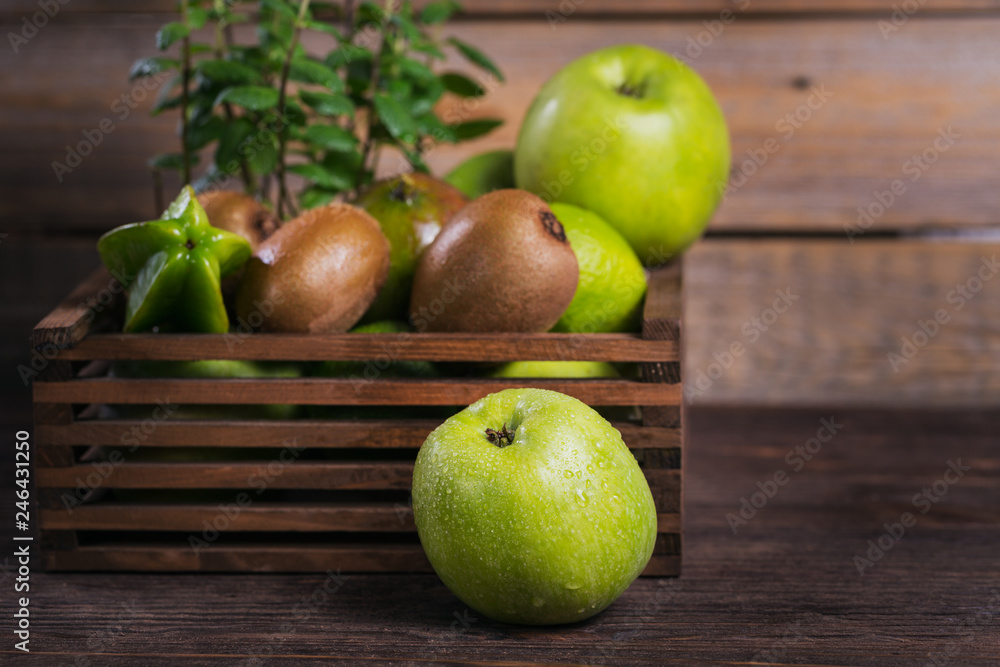 Set of green fruits for healthy diet and detox: apple, lime, kiwi, mango, carambola and mint. Set of green fruits for healthy diet and detox: apple, lime, kiwi, mango, carambola and mint.