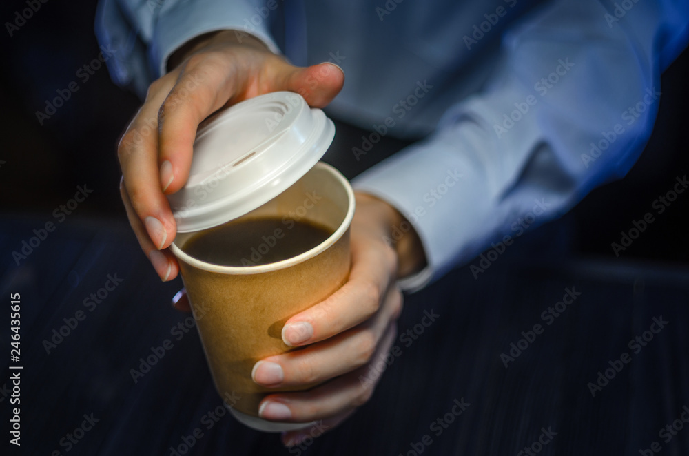 Barista serves coffee to the client. Hands Paper cup Bar counter Cappuccino Plastic cap. Coffee Business Concept Barista serves coffee to the client. Hands Paper cup Bar counter Cappuccino Plastic cap. Coffee Business Concept