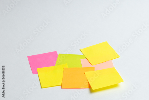 Message on paper with word Internet of Things on note stick on colorful book with laptop and a cup of coffee on glass table, top view image - Image, Many colorful note sticks