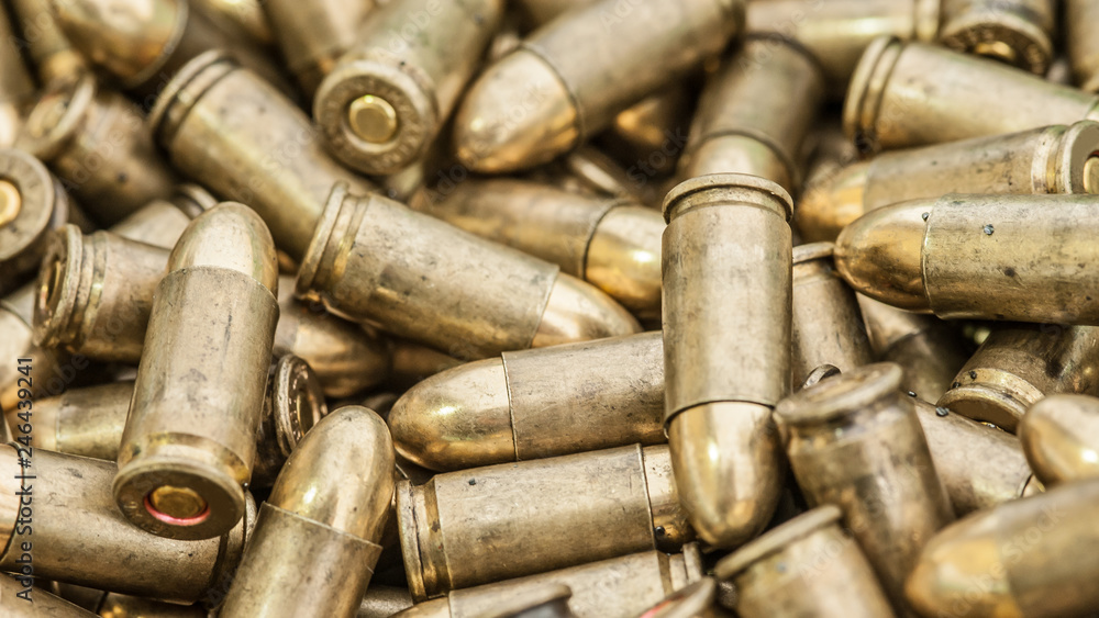 Top detail macro view of large group of gun bullets Top detail macro view of large group of gun bullets