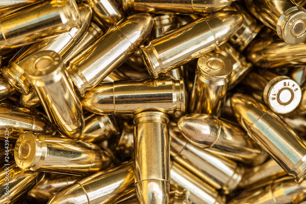Naklejka premium Top detail macro view of large group of gun bullets