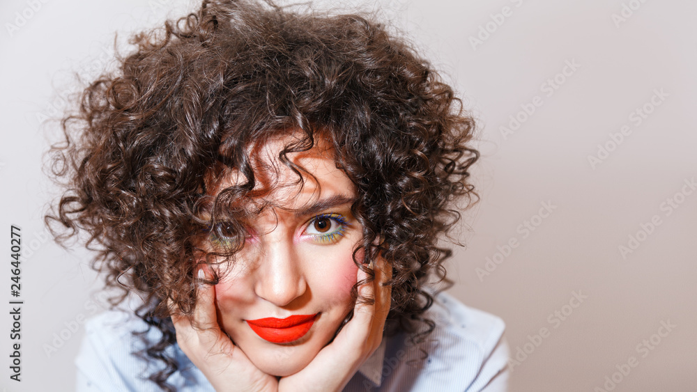 Close up portrait of a beautiful young woman with afro hairstyle Close up portrait of a beautiful young woman with afro hairstyle