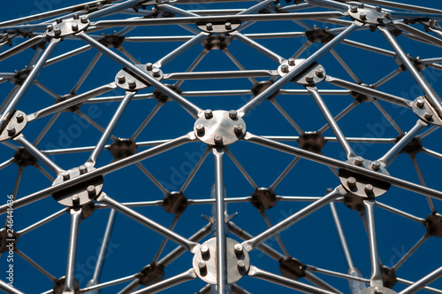 Steel construction on the blue sky background