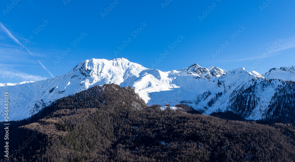 Fototapeta premium landscape Italian Alps with snow and blue sky view from Pragelato