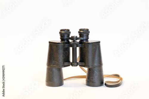 Binoculars on a white background. This is a vertical layout.