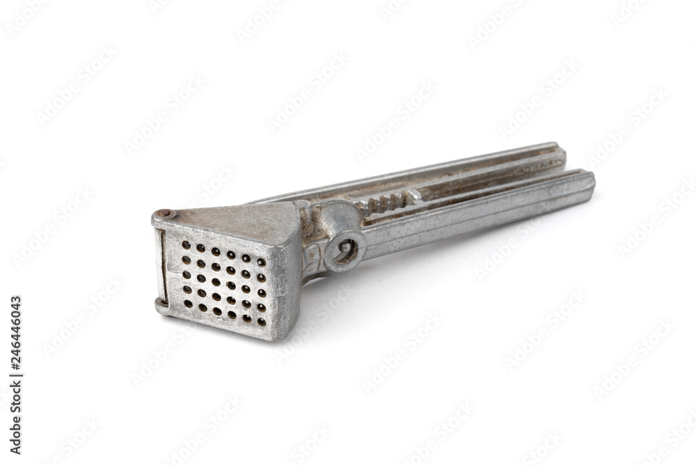 Old garlic press isolated on white background, Old garlic press isolated on white background,