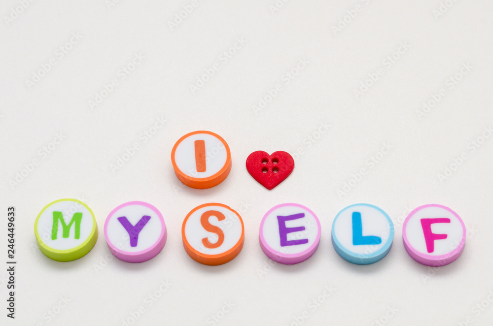 Fototapeta premium I love myself phrase made from colorful circles with letters and a heart shape button against white background