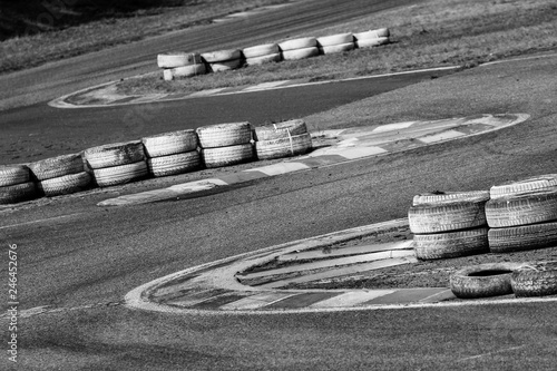 A detail picture of a part of the racetrack. The chicane with curbs and tires can be seen.  photo