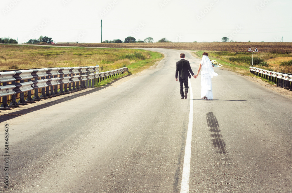 bride and groom cross the bridge, go away