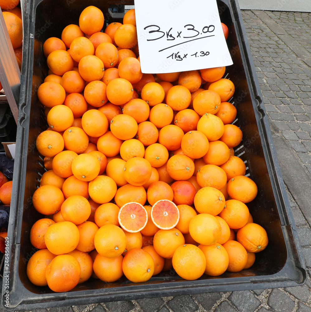 ripe oranges for sale with label and price