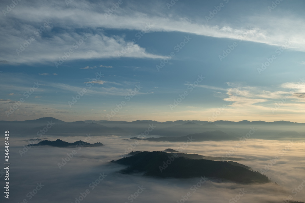 Fog, mountains, sunlight, beautiful mountain tops of the point of view. scenic beauty in the morning. Doi Lorgwador, Mae Moei, Tak in Thailand Fog, mountains, sunlight, beautiful mountain tops of the point of view. scenic beauty in the morning. Doi Lorgwador, Mae Moei, Tak in Thailand