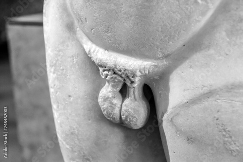 A detail picture of the ancient statue´s penis. It is broken, looks like impotency or castration photo