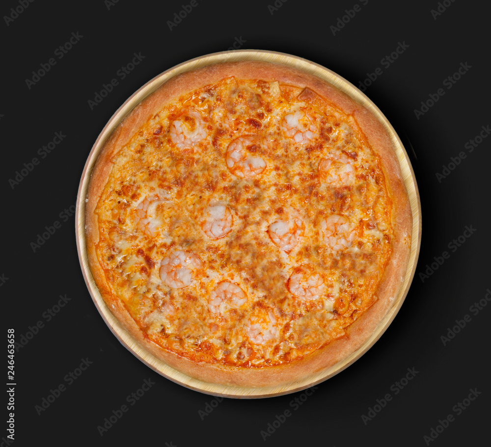 Isolated image of pizza with shrimps and olives on a black background