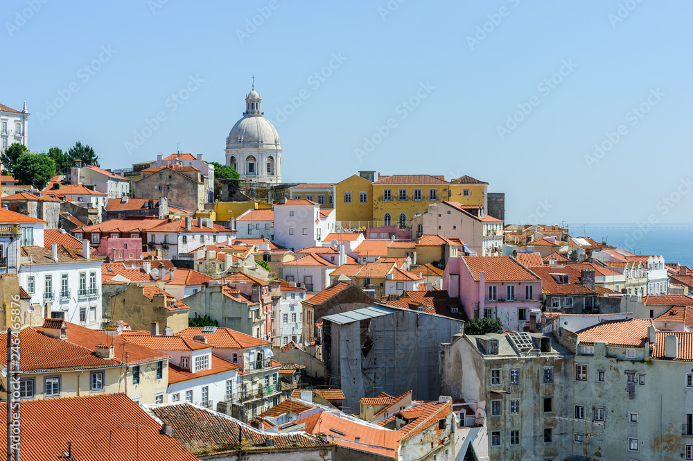 The red roofs of the old houses in the Alfama district in Lisbon, Portugal.