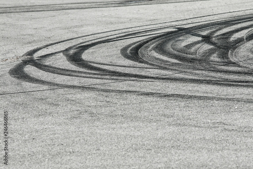 The rubber tracks from the rallye cars left on the tarmac in the hairpin. 
