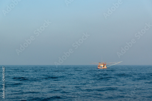 Fishing boat fishing in the ocean