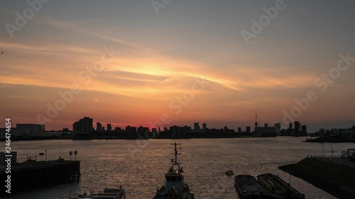 Colorful timelapse of sunrise over city of Rotterdam photo