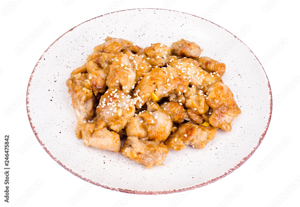 Plate with slices of chicken in batter with sesame seeds Plate with slices of chicken in batter with sesame seeds
