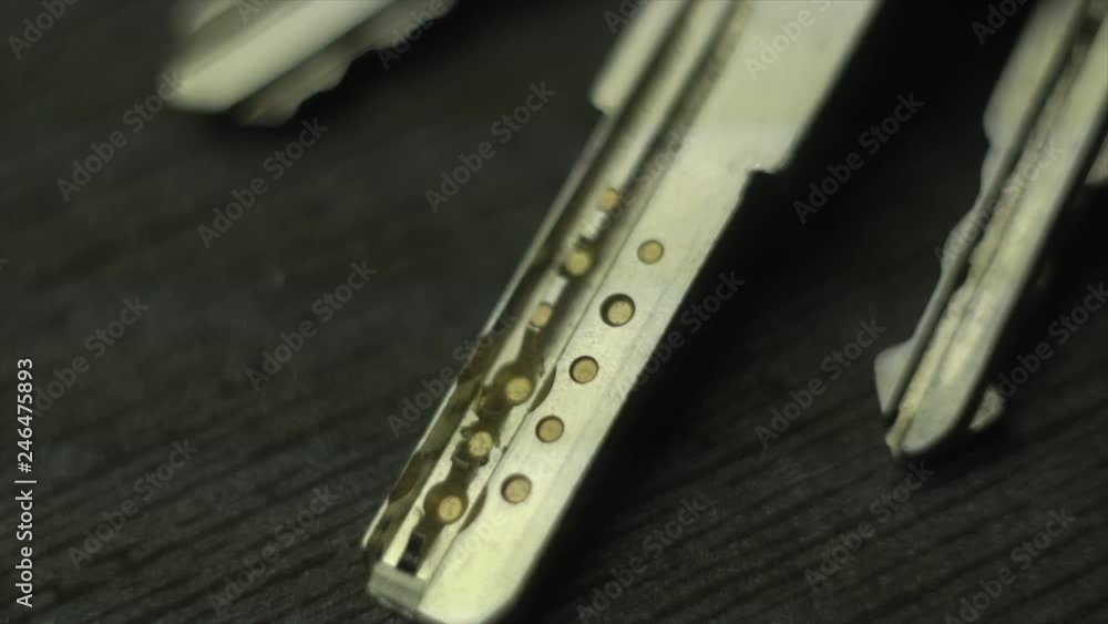 the bunch of different keys from the door locks close up the bunch of different keys from the door locks close up