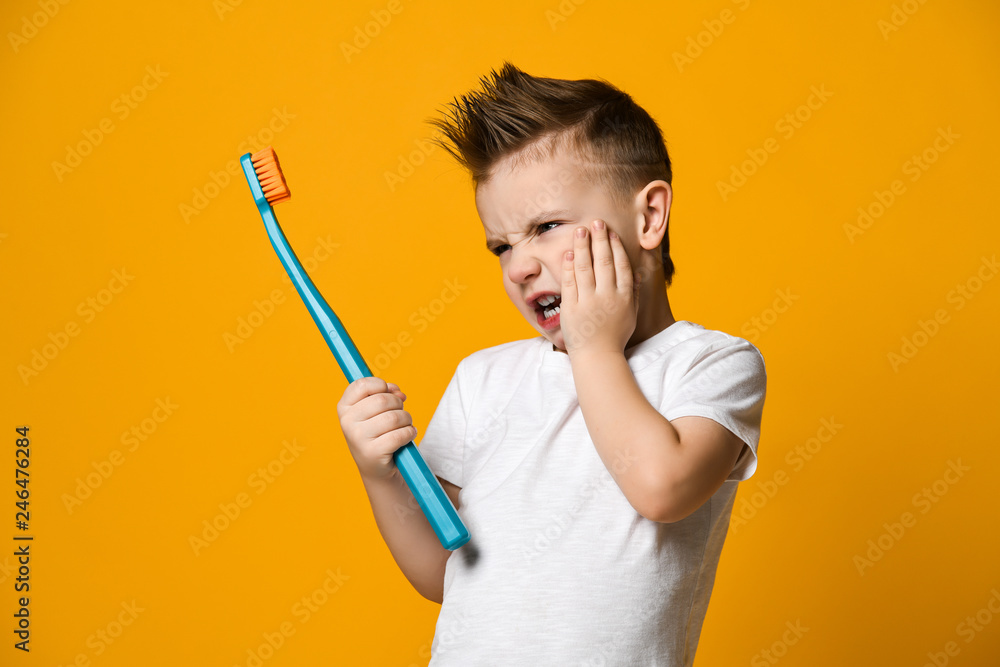 Little boy suffering from toothache - Dental problem. Little boy suffering from toothache - Dental problem.