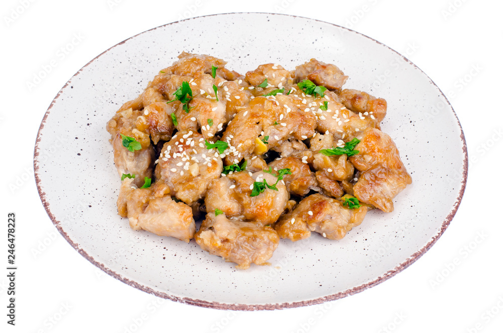 Plate with slices of chicken in batter with sesame seeds Plate with slices of chicken in batter with sesame seeds