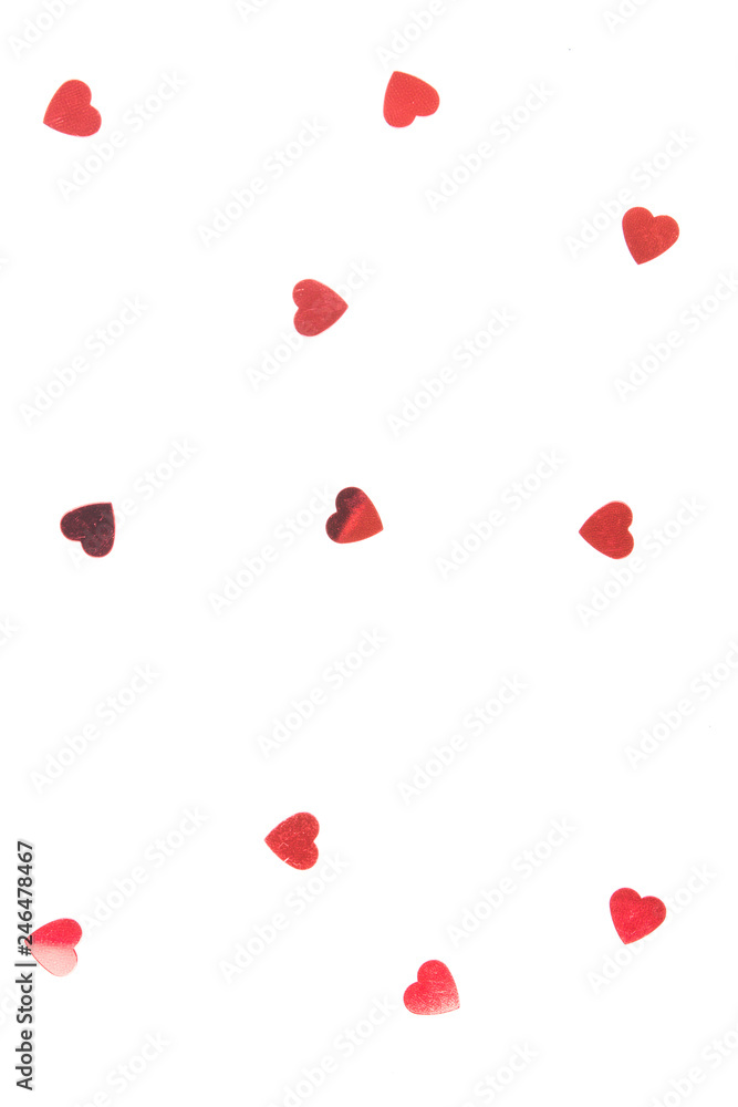 Sprinkles confetti in the form of the heart on a white background.